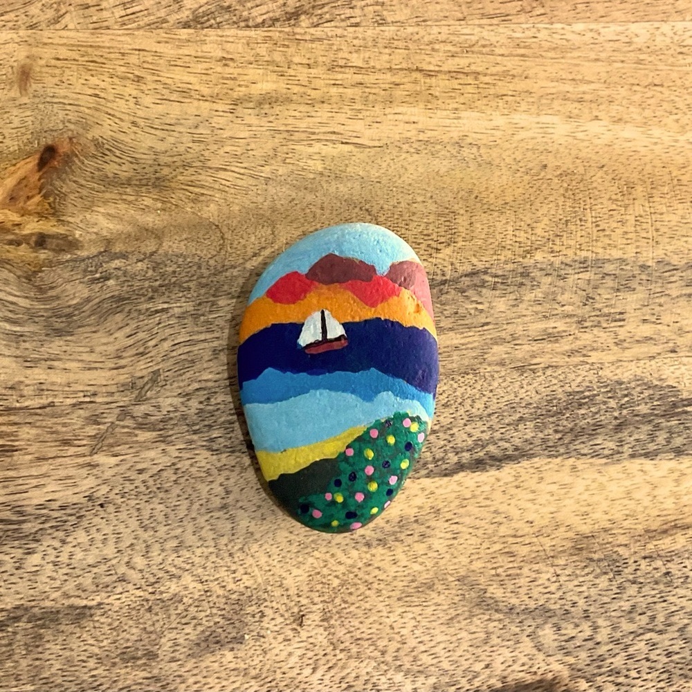 Vibrant Blue and Red Sailboat Scenery Painted Stone Art